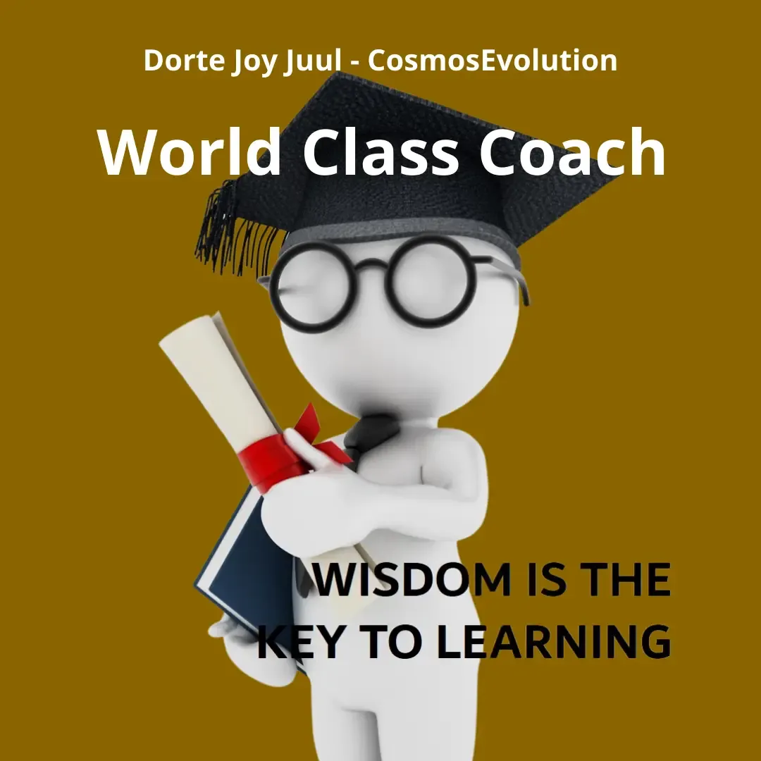 Illustration of a figure with glasses and a graduation cap, holding a book and a diploma. The text on the image reads: 'World Class Coach. Wisdom is the key to learning'. The name 'Dorte Joy Juul, CosmosEvolution' appears at the top of the image.